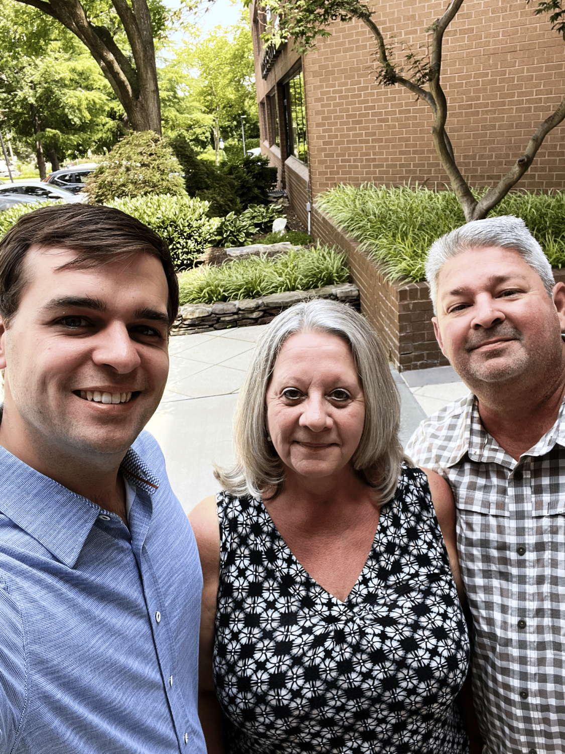 Susan and Dennis H., retiring federal-government sellers, celebrating the closing of their Dale City, Woodbridge VA home sale with David Mount in 2022