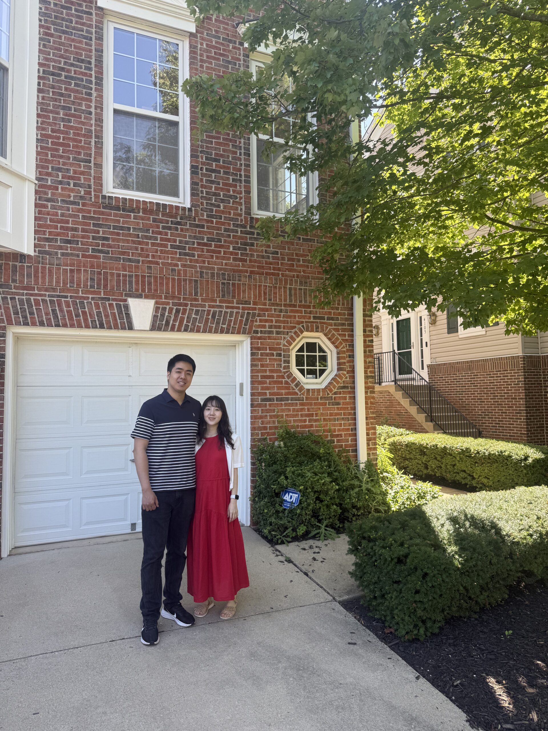 Daniel Lee family closing photo, first-time buyers of a Fairfax VA townhouse, 2026