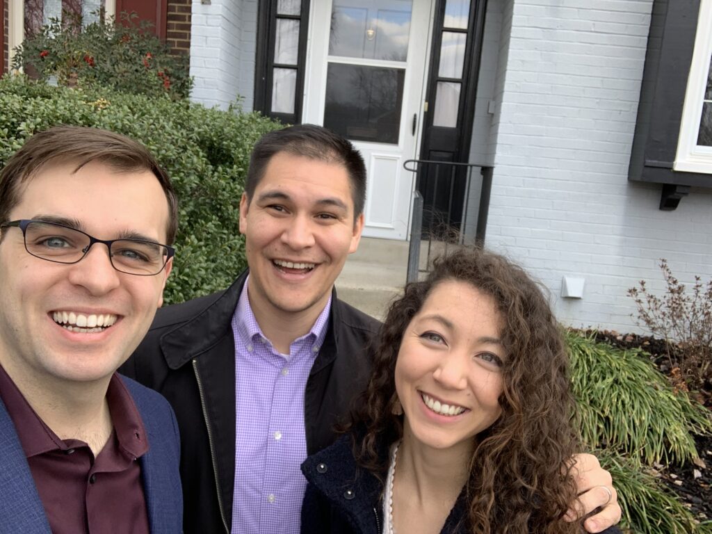 David Mount with repeat clients Kris and Jinae at closing on the sale of their Woodgate Manor home in Centreville, VA, 2026