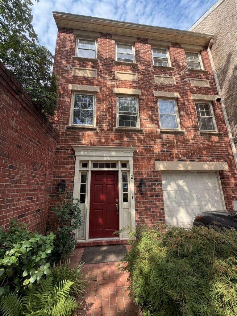 Front exterior of the Old Town Alexandria townhouse David Mount's clients purchased off-market for $1.5 million in 2026